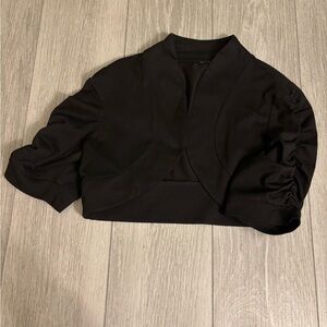 Bolero jacket in black with ruched sleeves. EUC.